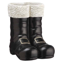 A pair of black Santa-style boots with a thick, textured cream faux-fur cuff and gold buckle details on the sides, shown against a plain white background.