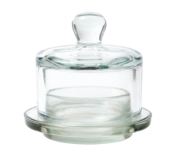 Clear round glass jam container with a lid on a white background