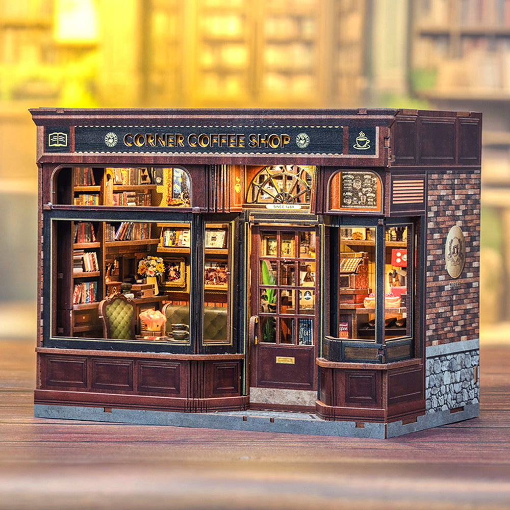 Model of a corner coffee shop with detailed interior and exterior.