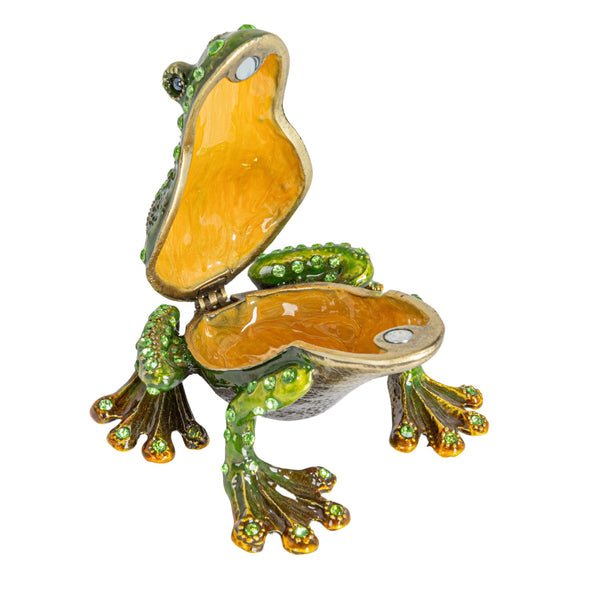 Decorative frog trinket box with open lid on a white background