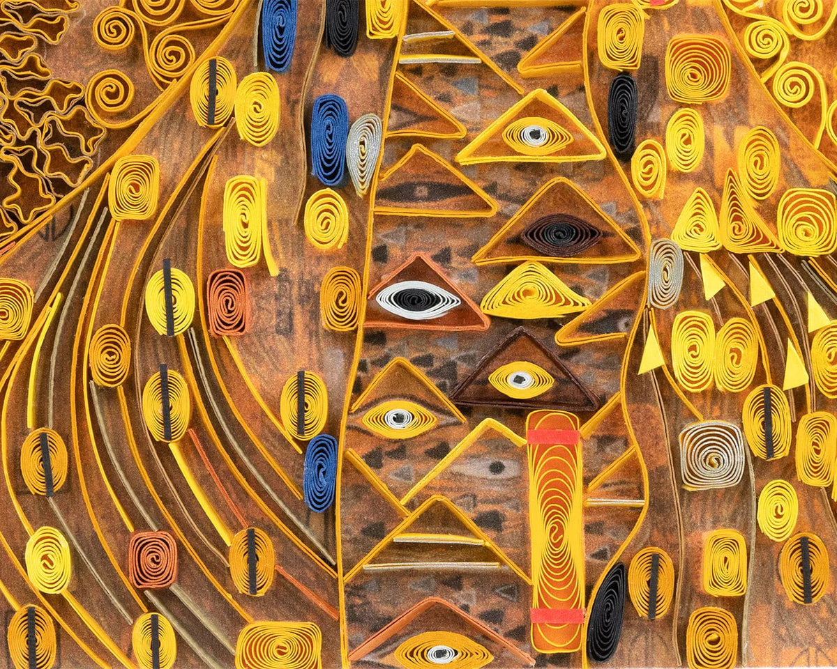 Close up of quilled greeting card resembling Klimt's 'Lady in Gold'