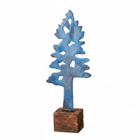 A decorative metal tree sculpture with a distressed blue finish, mounted on a square rustic brown wooden base against a plain white background.