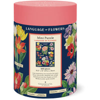 Cylindrical puzzle box with floral design and 'Language of Flowers' text