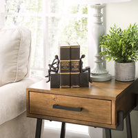 Man and Woman Reading on a Block Cast Iron Bookend Set | Danya B.