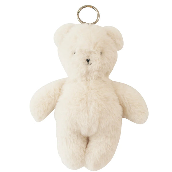 Small cream teddy bear keychain on a white background