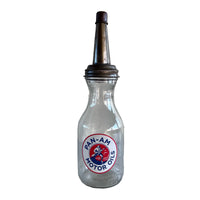 Vintage Pan-Am Motor Oils bottle on a white background