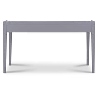 The back side of a gray rectangular desk with three drawers on a white background.