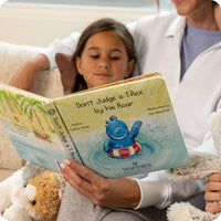 Don't Judge A T-Rex By His Roar Board Book | Warmies®