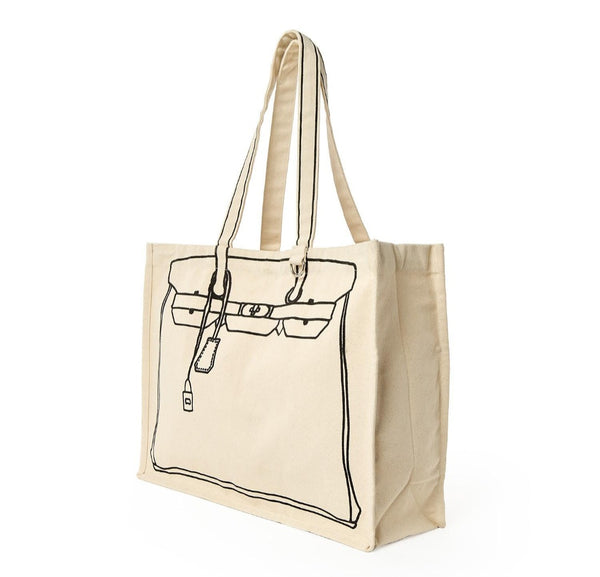 Beige tote bag with black tote bag outline design on a white background