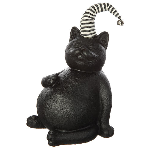 A black cast-iron cat figurine with a round belly, wearing a black and white striped nightcap with a small silver bell, set against a plain white background.