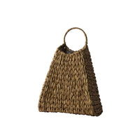 Brown woven bag with a circular handle on a white background